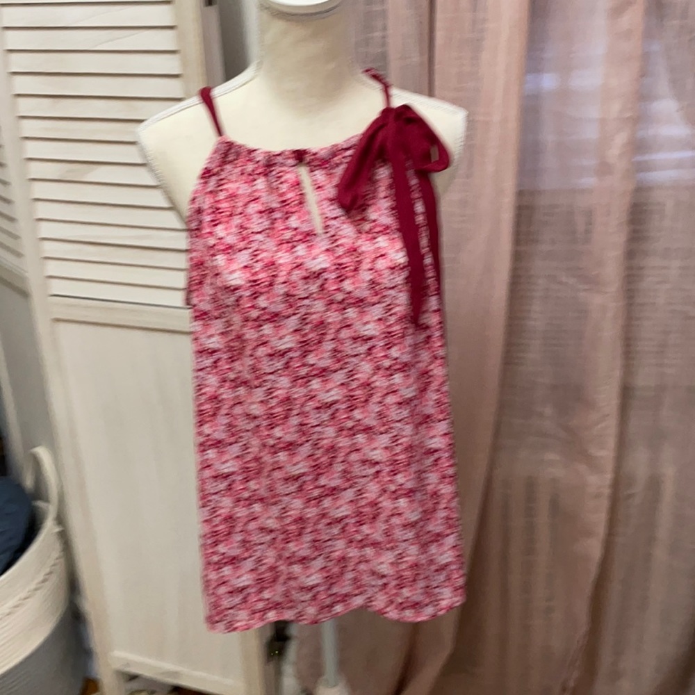 Beautiful floral top with unique tie sleeve